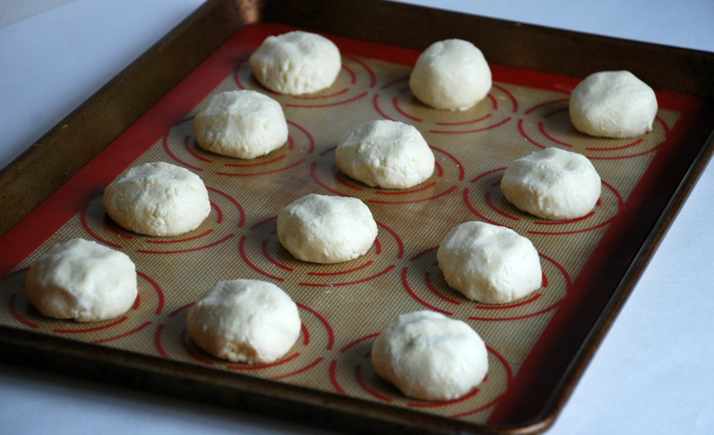 baking sheet of unbaked Brazilian cheese bread