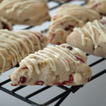 Gluten free white chocolate cranberry scone side drizzled