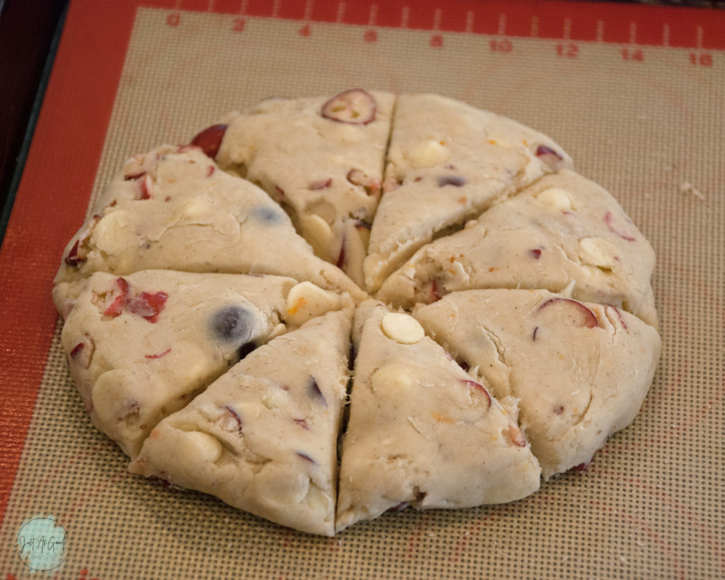 Gluten free white chocolate cranberry scone dough round cut