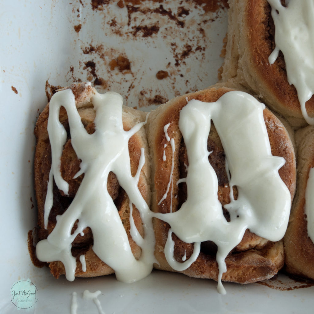 Gluten Free Cinnamon Roll Corner of Dish with Icing