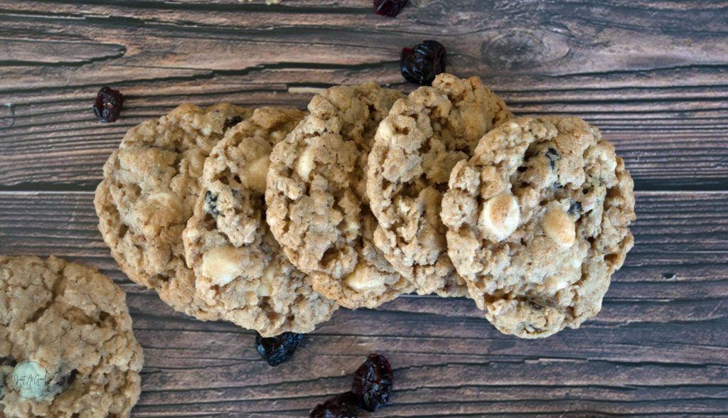 Oatmeal, cranberry and white chocolate cookies lined up