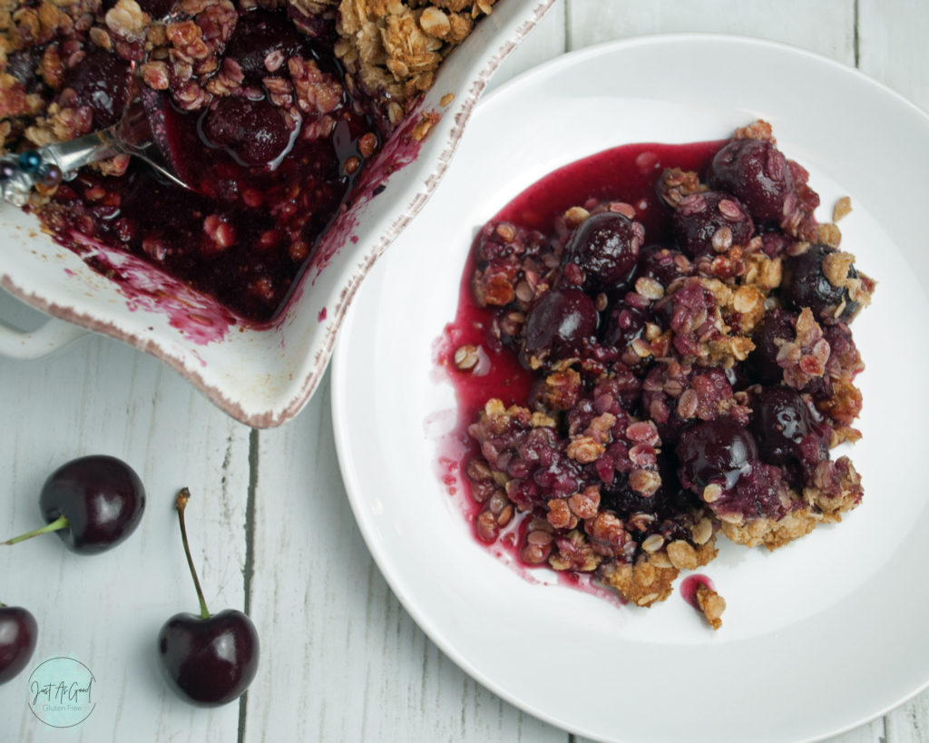 Gluten free cherry crisp on plate close up