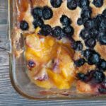 Gluten free blueberry peach cobbler corner of pan removed