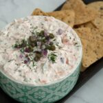 top view of smoked salmon dip bowl with tortilla chips