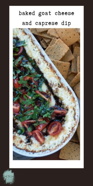 dish of caprese dip topped with basil, tomatoes, and balsamic vinegar surrounded by crackers