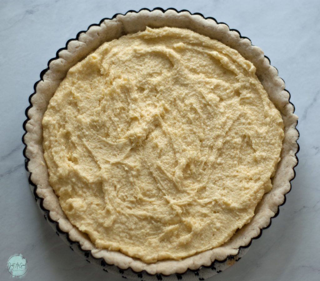 gluten free tart with frangipane filling before rhubarb