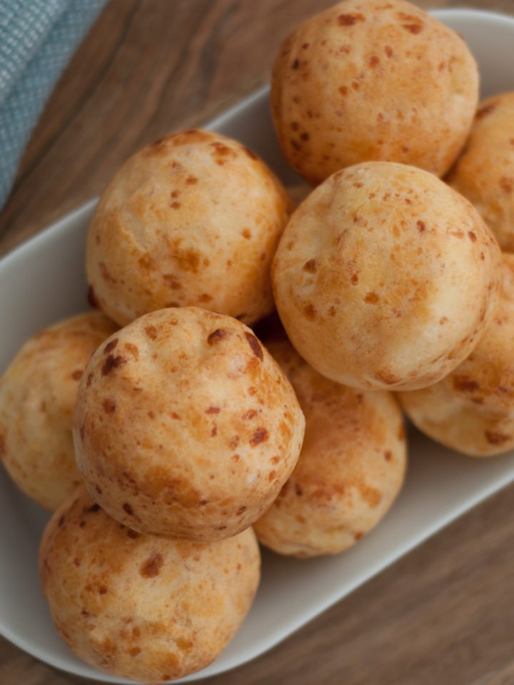 A birds eye view of a plate of Gluten Free Brazilian Cheese Bread Rolls