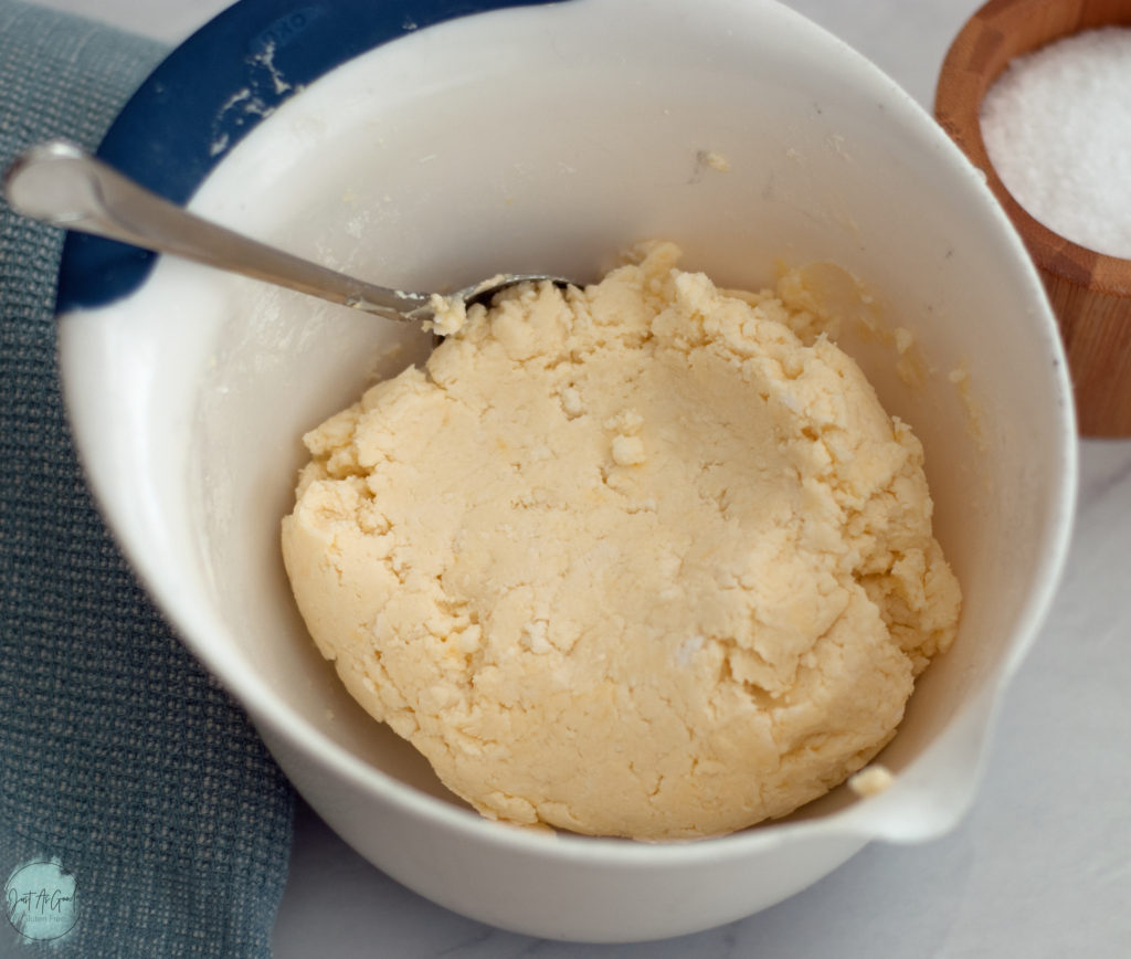 A mixing bowl of cheese bread dough