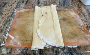 Gluten free Cinnamon Twist Bun dough folded into two thirds