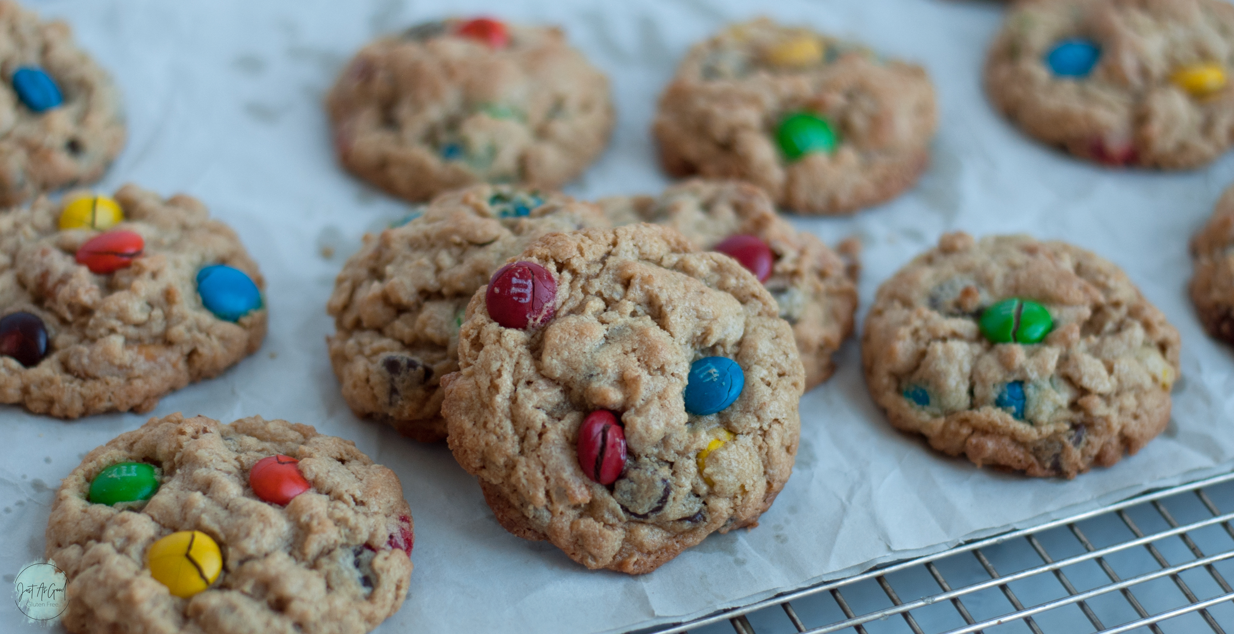 Gluten free monster cookie tilted on rack