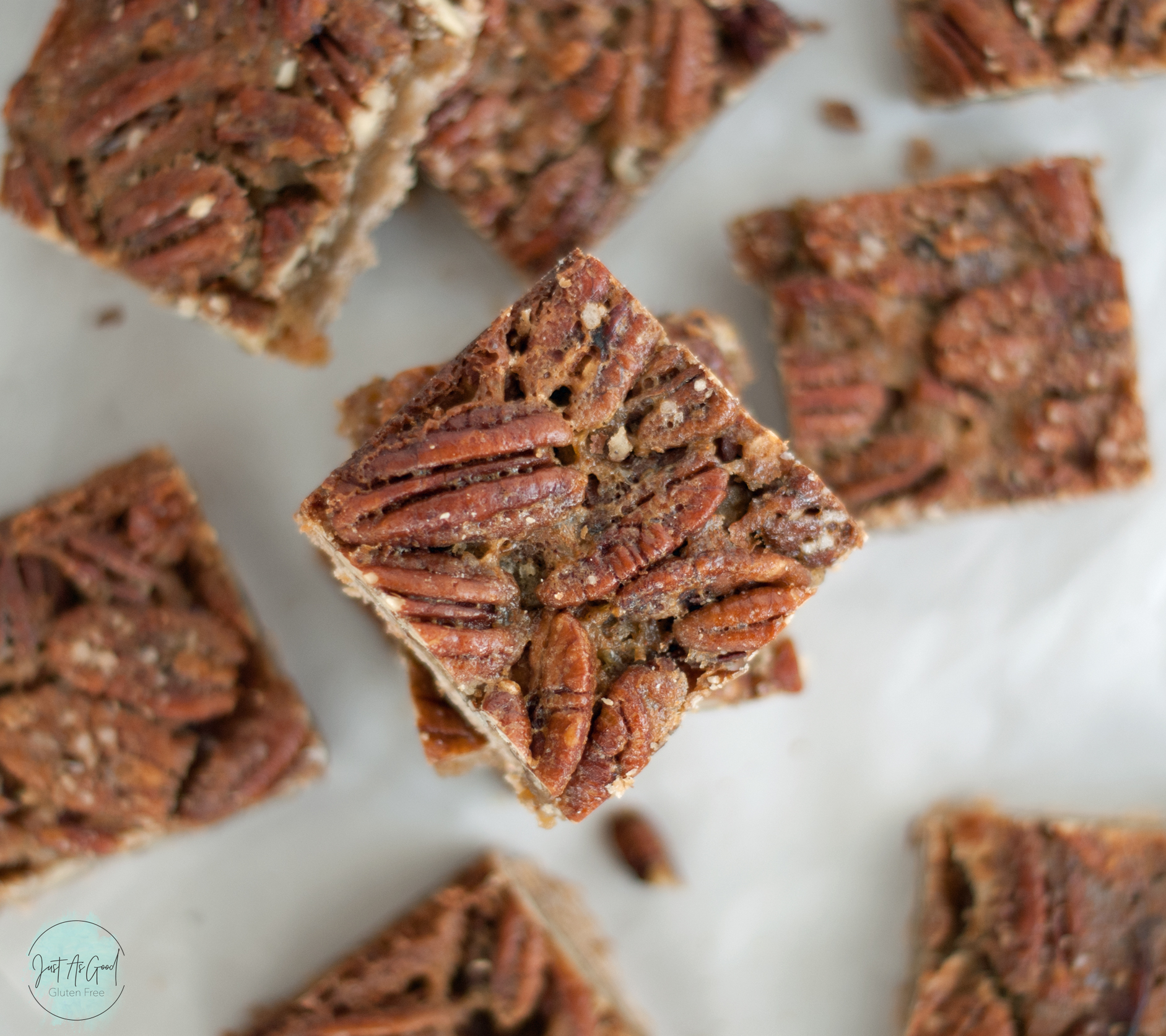 a top view of pecan pie bars stacked and cut