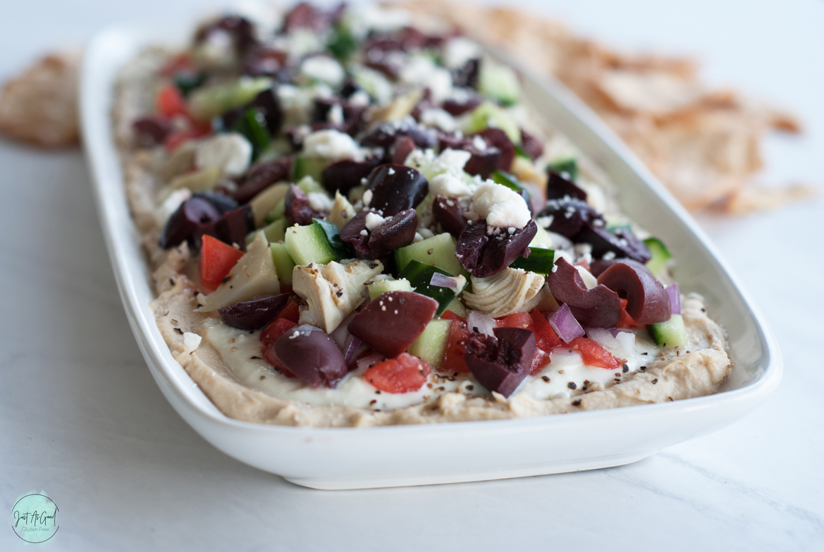 layers of hummus, whipped feta, tomatoes, cucumbers, artichokes, red onion and kalamata olives with crackers