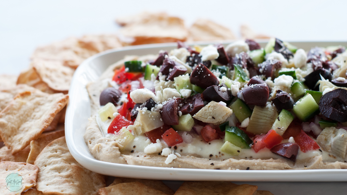 7 Layer Mediterranean Dip wide view with crackers