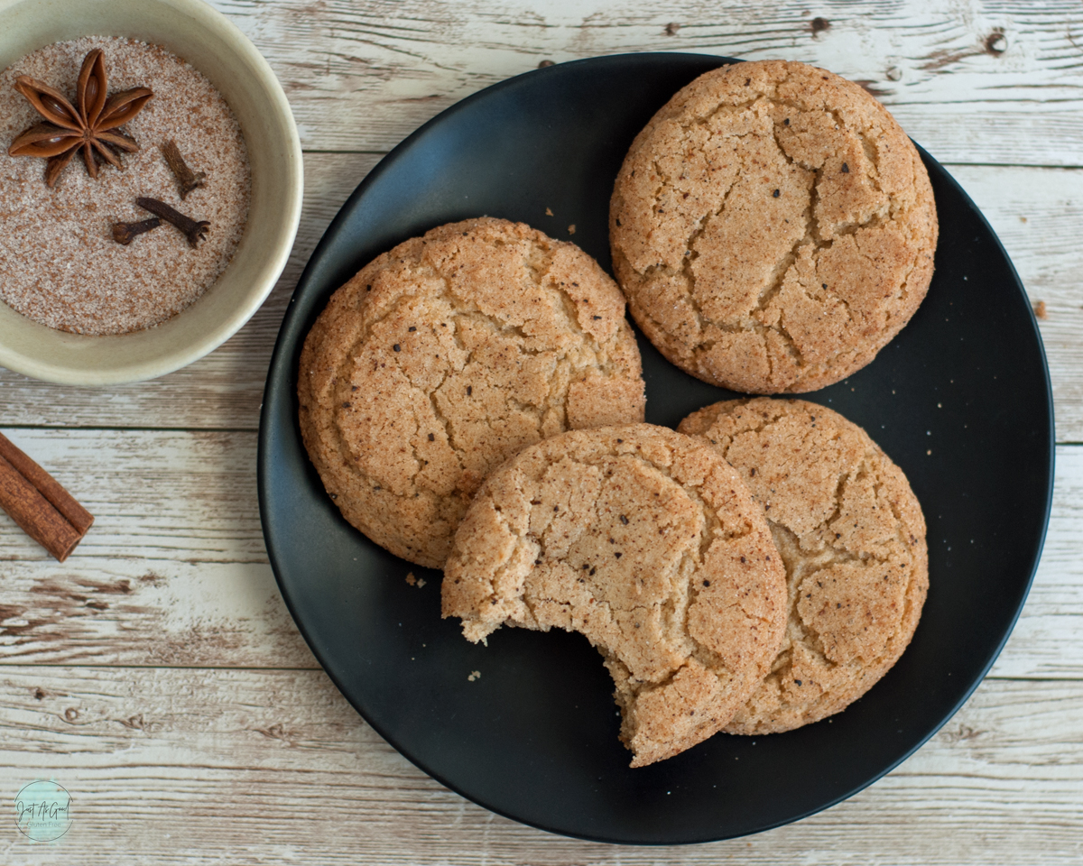 birds eye view of a plate of gluten free chai snickerdoodle cookies with a bite taken out